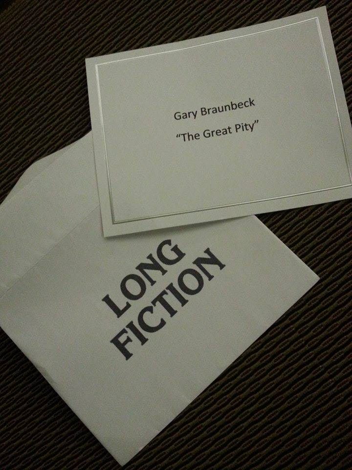 Envelope with LONG FICTION on it, and a white card with silver embossed border. On the card, in sans serif typeface GARY BRAUNBECK, "THE GREAT PITY"